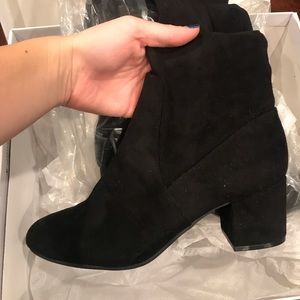 Thigh high black boots